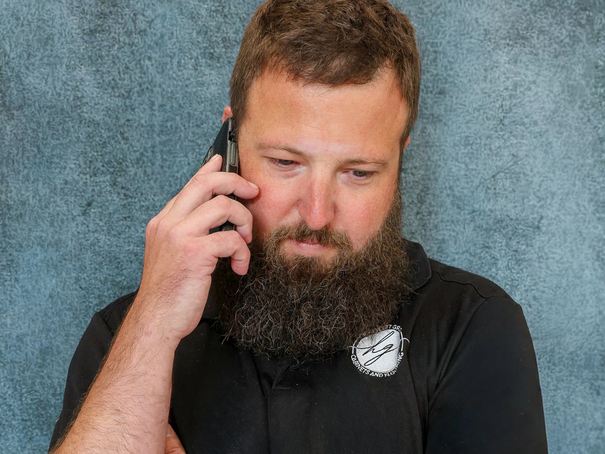 Dylan Whitley of Honeycutt Group taking a homeowner call in the Salisbury showroom