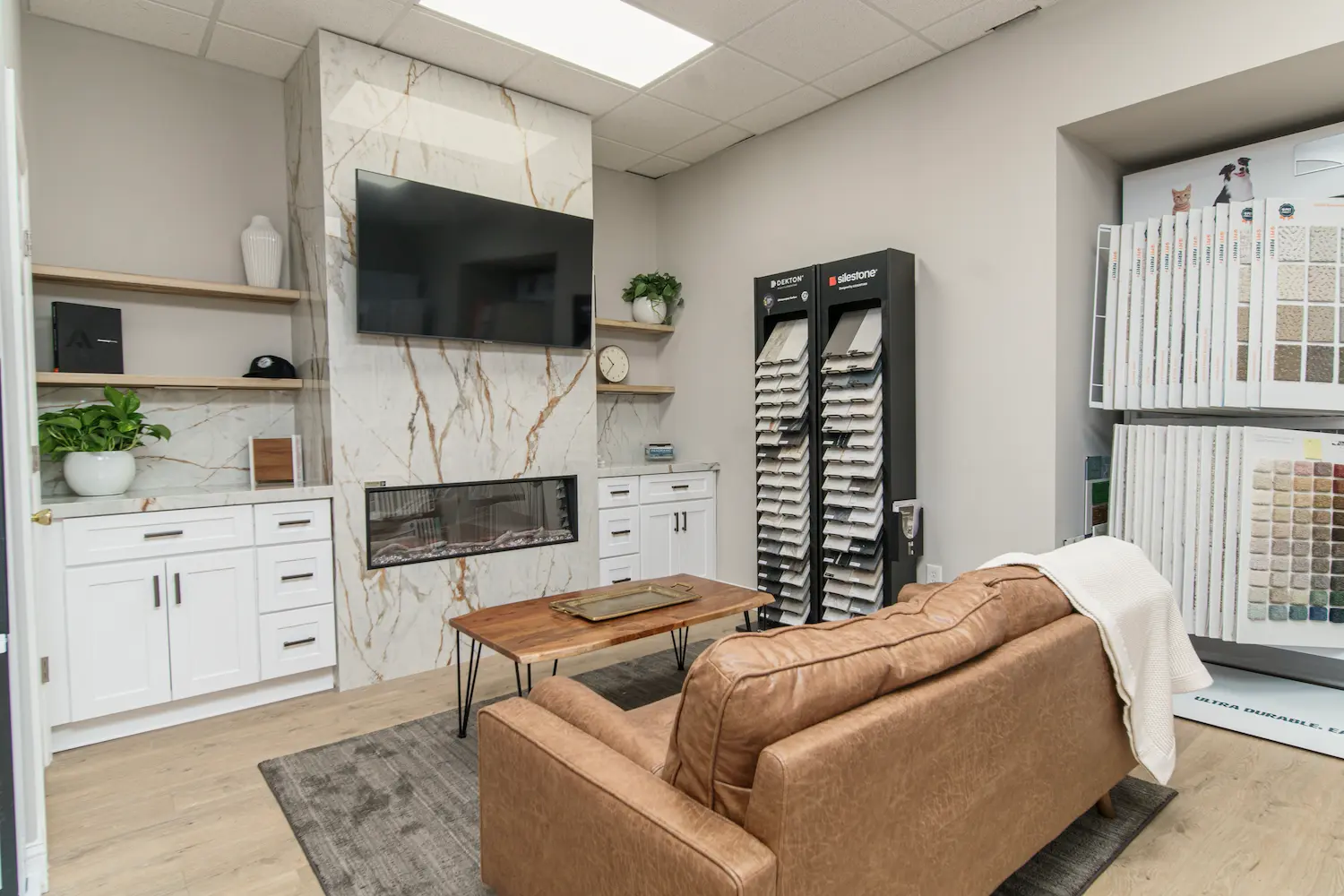 Honeycutt Group showroom in Salisbury, NC, featuring a fireplace, samples, and a comfortable seating area